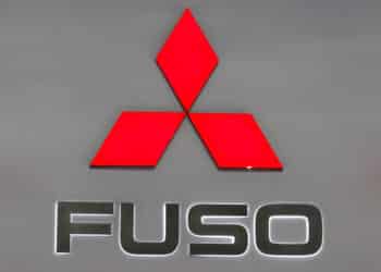 Daimler AG's Mitsubishi Fuso division's logo is seen at the IAA Commercial Vehicles Show in Hanover, Germany, on Wednesday, Sept. 22, 2010. Daimler AG said today that it isn't in talks with Fiat SpA about taking over the Italian carmaker's industrial operations, after la Repubblica reported that the German company made a 9 billion-euro ($12 billion) pre-offer.