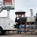 Steve Pishler, a master service technician with Determan Fluid Solutions, performs a semi-annual calibration on an ethanol delivery pump at the Great River Energy Blue Flint Ethanol plant in Underwood, North Dakota, U.S., on Thursday, Feb. 9, 2012. North Dakota will hold its Republican presidential caucus on March 6.