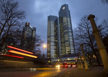The twin tower skyscraper headquarter offices of Deutsche Bank AG stand at night in Frankfurt, Germany, on Monday, Jan. 2, 2017. Deutsche Bank is fighting 47 civil lawsuits from investors claiming losses from the manipulation of interbank lending rates, according to a regulatory filing.