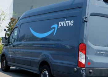 SAN DIEGO, CALIFORNIA - AUGUST 2: An Amazon Prime logo is displayed on a delivery truck outside an Amazon delivery station on August 2, 2025 in San Diego, California.