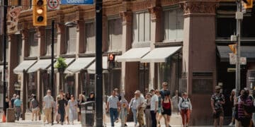 Pedestrians on Queen St. in Toronto, Ontario, Canada, on Thursday, July 3, 2025. Canadian consumer prices held steady while core measures eased slightly, likely giving some relief to Bank of Canada policymakers who had raised concerns about hotter underlying inflation prints in recent months.