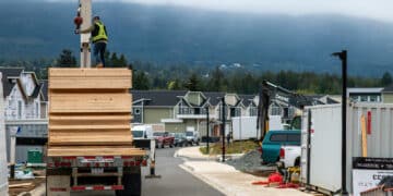 Supplies are delivered to a subdivision construction site in Nanaimo, British Columbia, Canada, on Wednesday, Sept. 11, 2024. Collecting, processing, and upcycling used cooking oil, Ergo Eco Solutions diverts waste from landfills by refining it into their concrete and asphalt construction release agents, biodiesel products, and specialized animal feed.