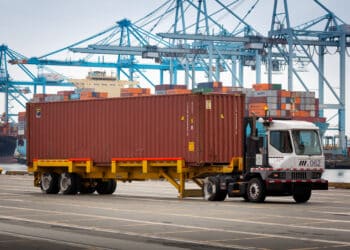 A shipping container on a truck at the Fenix Marine Services terminal at the Port of Los Angeles in Los Angeles, California, US, on Friday, Aug. 15, 2025. Higher US tariffs have started to filter through to consumers in categories such as household furnishings and recreational goods.