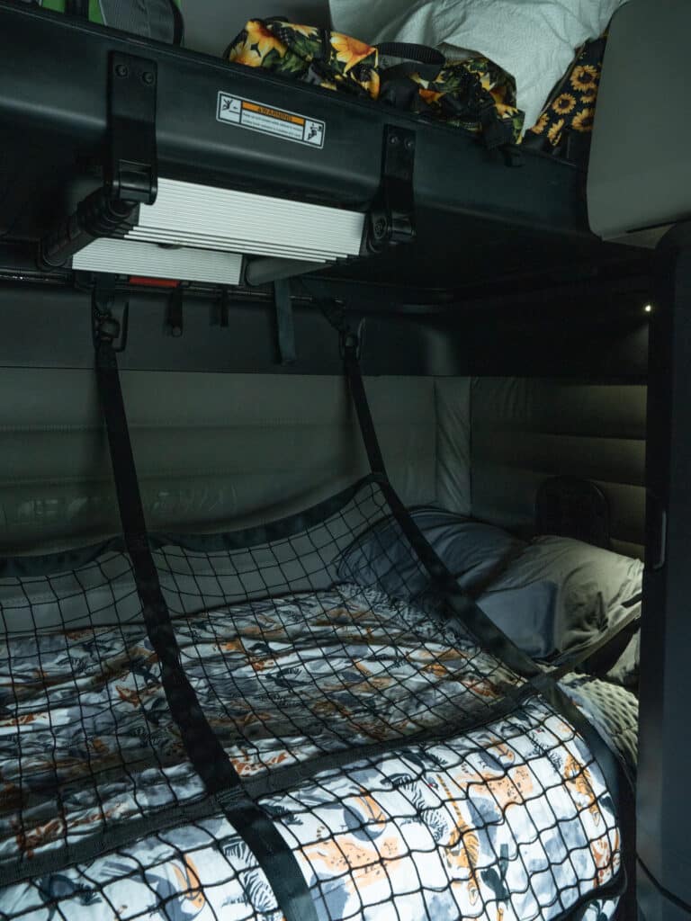 The sleeping area of a Walmart truck.