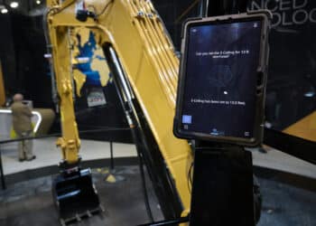 The Cat Ai Assistant interface displayed at the Caterpillar booth during the 2026 CES event in Las Vegas.