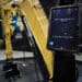 The Cat Ai Assistant interface displayed at the Caterpillar booth during the 2026 CES event in Las Vegas.