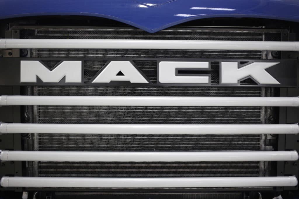 The Mack logo is seen on the grille of a semi truck at the Mack Trucks Inc. cab and vehicle assembly facility in Macungie, Pennsylvania U.S., on Thursday, Dec. 20, 2018. The Institute for Supply Management (ISM) is scheduled to release manufacturing figures on January 3.