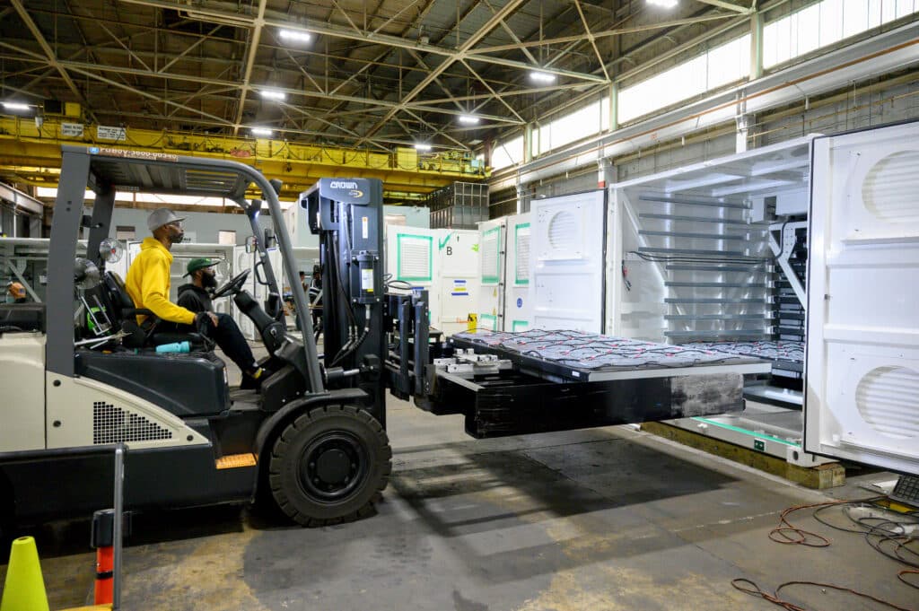 A worker drives a forklift at the Eos Energy Enterprises Inc. manufacturing facility in Turtle Creek, Pennsylvania, US, on Tuesday, May 27, 2025. Eos Energy, whose stock has surged more than 720% over the past year, has signed an initial pact with a large-scale developer of data centers as soaring power usage boosts demand for batteries.
