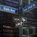 Street signs for Park Ave and East 53rd Street in front of the Seagram Building, which houses Blue Owl offices, in New York, US, on Wednesday, April 8, 2026. The outlook on the flagship fund of private credit giant Blue Owl Capital Inc. was cut to negative by Moody's Ratings, the latest sign of mounting strains in an industry stung by investors rushing to pull their money from funds aimed at retail buyers.