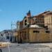 Workers install roofing on a home under construction in Vacaville, California.