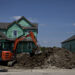 A worker operates a Hitachi Construction Machinery Co. excavator to dig a trench outside a new home under construction at a Lennar Corp. development in Montgomery, Illinois, U.S., on Wednesday, May 15, 2019. A stronger-than-expected increase in housing starts at the beginning of the second quarter bodes well for residential investment to make a contribution to GDP growth after five quarters of declines.