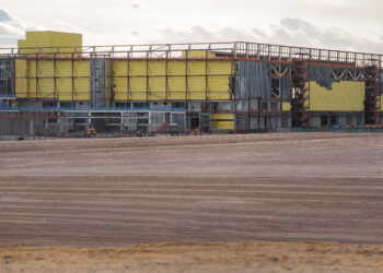 A new section of the Taiwan Semiconductor Manufacturing Company (TSMC) fabrication plant under construction in Phoenix, Arizona, US, on Monday, March 3, 2025. Taiwan Semiconductor Manufacturing Co., the worlds top producer of AI chips, plans to invest an additional $100 billion in US plants that will boost its chip output on American soil and support President Donald Trumps goal of increasing domestic manufacturing.